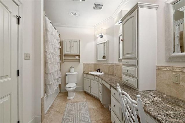 full bathroom featuring vanity, shower / bath combo, crown molding, tile patterned floors, and toilet