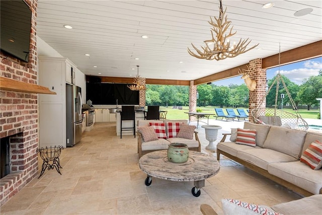 view of patio featuring an outdoor living space and sink