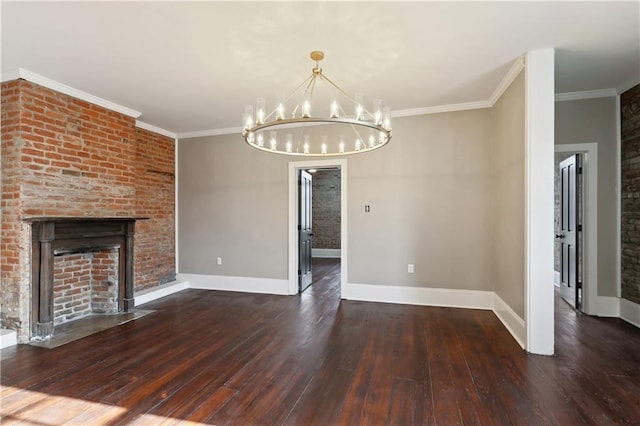 unfurnished living room featuring an inviting chandelier, wood-type flooring, crown molding, and baseboards