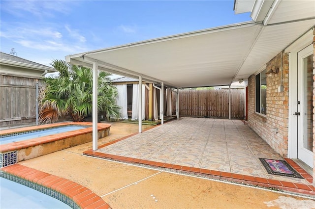 view of patio / terrace featuring a pool