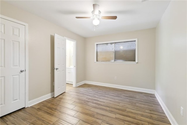 unfurnished bedroom featuring light hardwood / wood-style flooring and ceiling fan