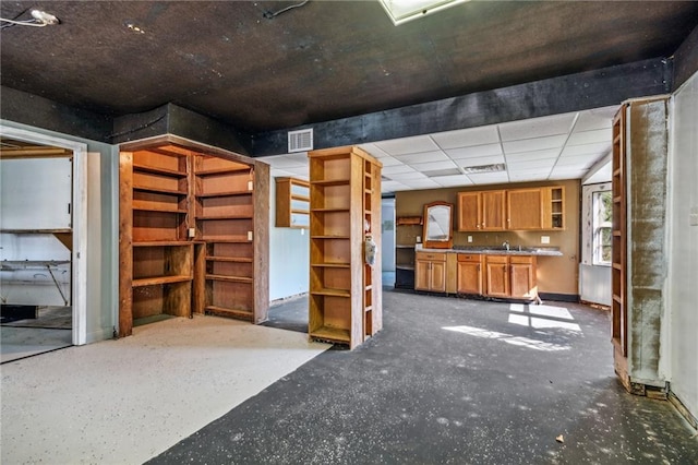 4210 Murano Rd, New Orleans, LA 70129 - miscellaneous room featuring a sink and baseboards