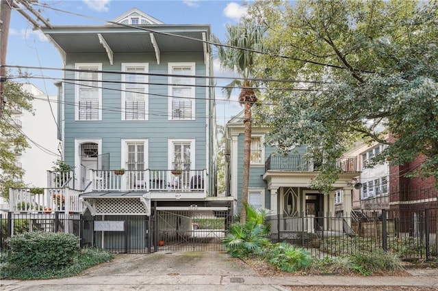 view of front of home featuring a balcony