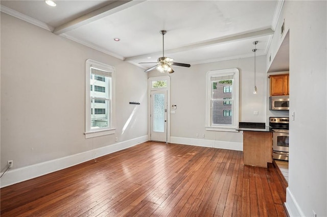 interior space featuring ornamental molding, dark wood-type flooring, beamed ceiling, and ceiling fan