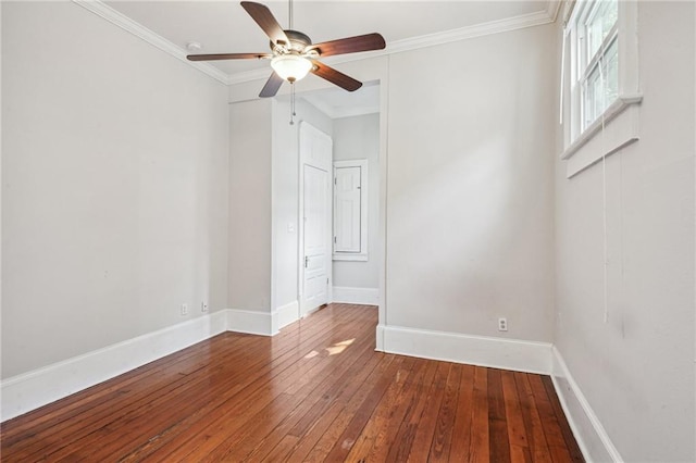 spare room featuring hardwood / wood-style flooring, ceiling fan, and ornamental molding