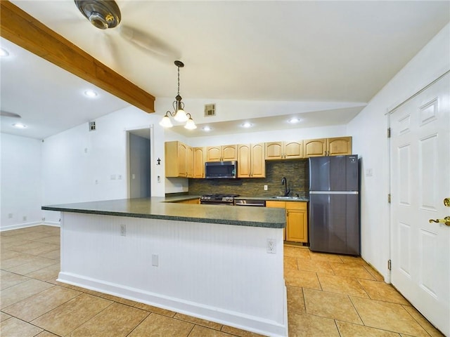 kitchen with pendant lighting, lofted ceiling with beams, tasteful backsplash, light brown cabinetry, and appliances with stainless steel finishes