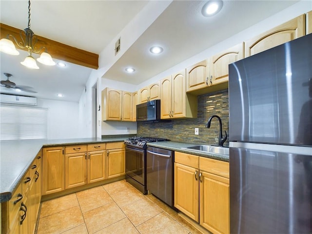 kitchen featuring sink, a wall mounted AC, pendant lighting, ceiling fan with notable chandelier, and appliances with stainless steel finishes