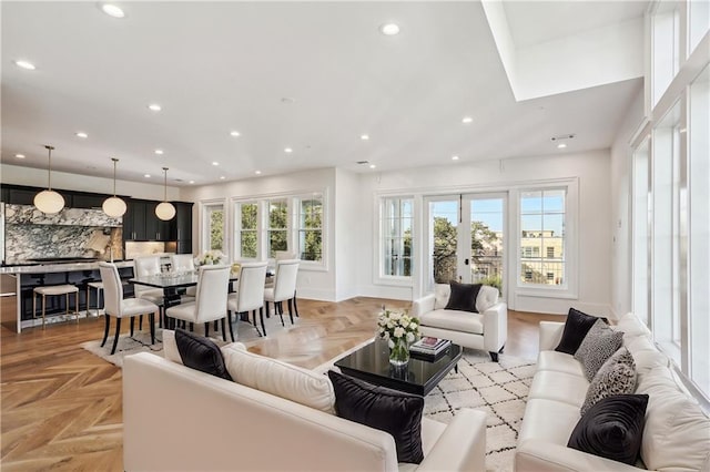 living room with french doors and light parquet floors