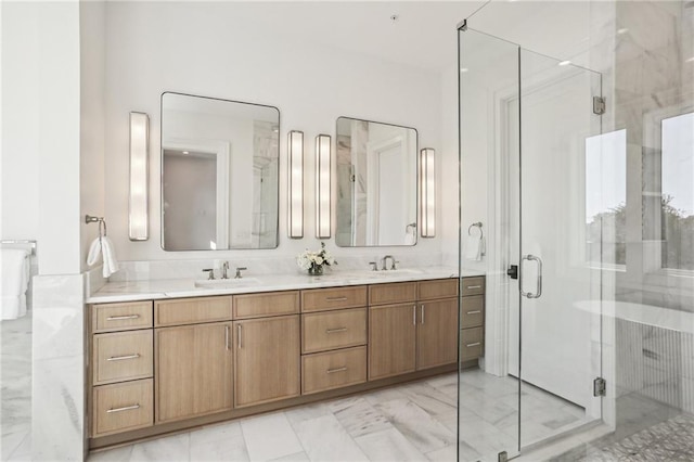 bathroom with vanity and an enclosed shower