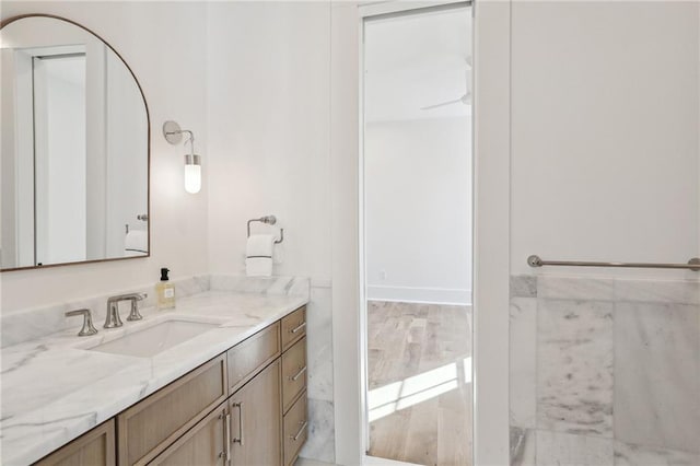 bathroom featuring vanity and wood-type flooring