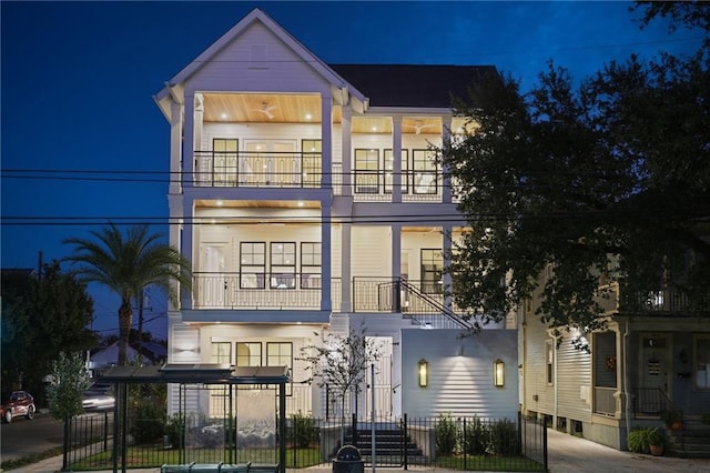 view of front of home featuring a balcony