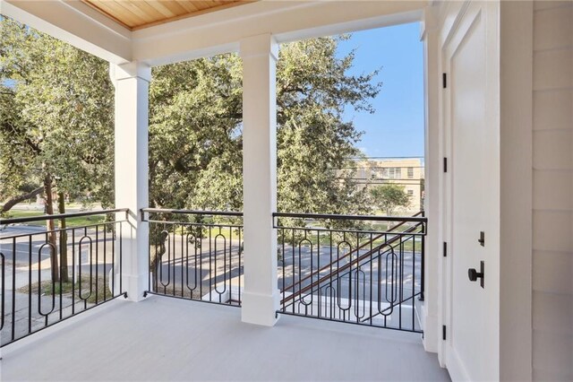2435 Napoleon Ave Unit 2A, New Orleans, LA 70115 - kitchen featuring light hardwood / wood-style floors, sink, wall chimney exhaust hood, high quality appliances, and pendant lighting