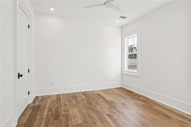 2435 Napoleon Ave Unit 2A, New Orleans, LA 70115 - full bathroom featuring tile walls, tiled shower / bath, toilet, and vanity