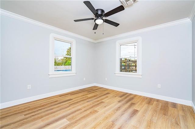 unfurnished room featuring ornamental molding, light hardwood / wood-style flooring, and ceiling fan