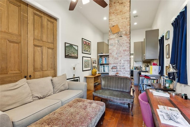 living room featuring high vaulted ceiling, dark wood-type flooring, and ceiling fan