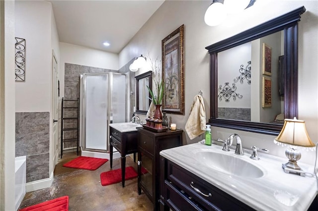 bathroom with vanity, separate shower and tub, and concrete floors