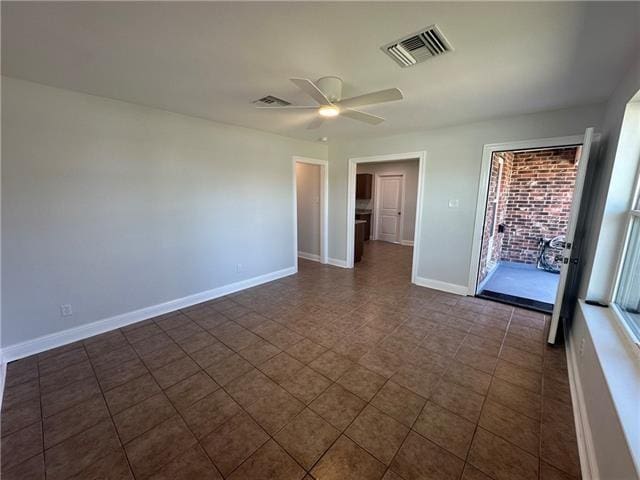 spare room featuring ceiling fan