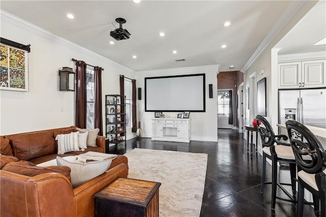 cinema room with ornamental molding and a healthy amount of sunlight