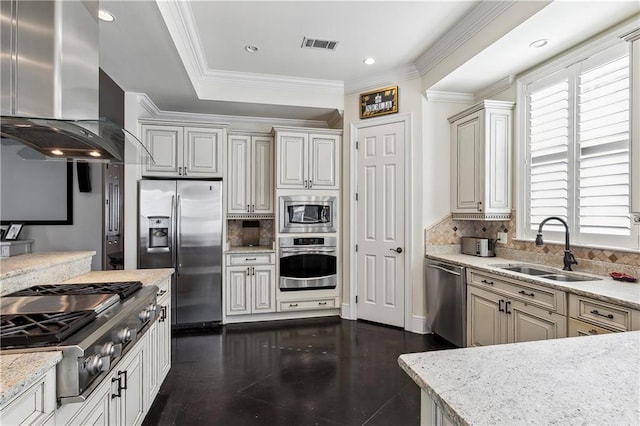 kitchen featuring light stone countertops, extractor fan, stainless steel appliances, sink, and backsplash