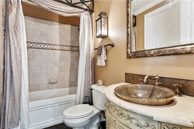 full bathroom with toilet, vanity, crown molding, and shower / bathtub combination with curtain