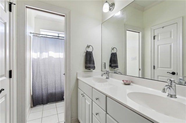 bathroom with tile patterned floors and vanity