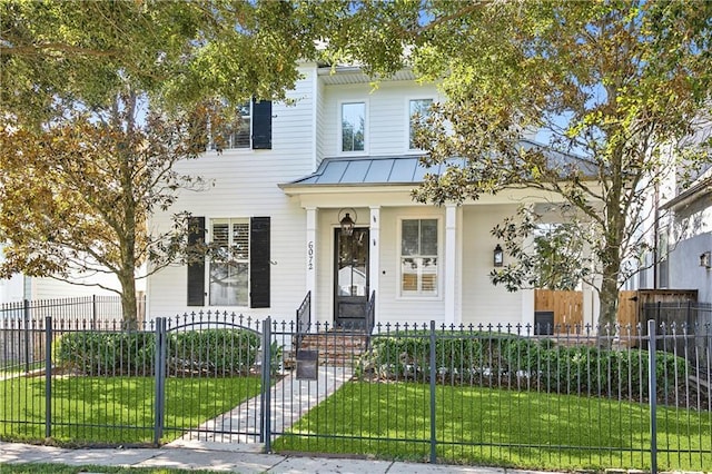 view of front of home with a front yard