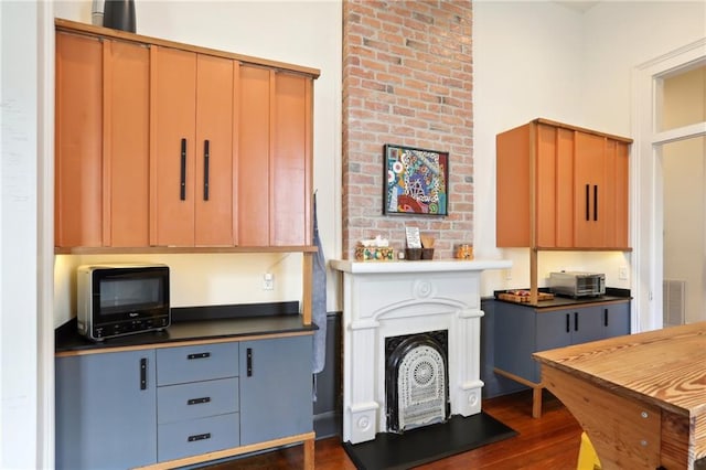 kitchen with dark hardwood / wood-style floors