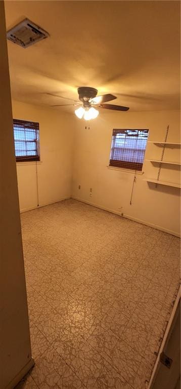 office area featuring carpet flooring and ceiling fan