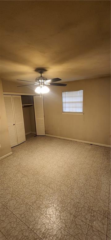 view of patio / terrace featuring a storage unit and ac unit