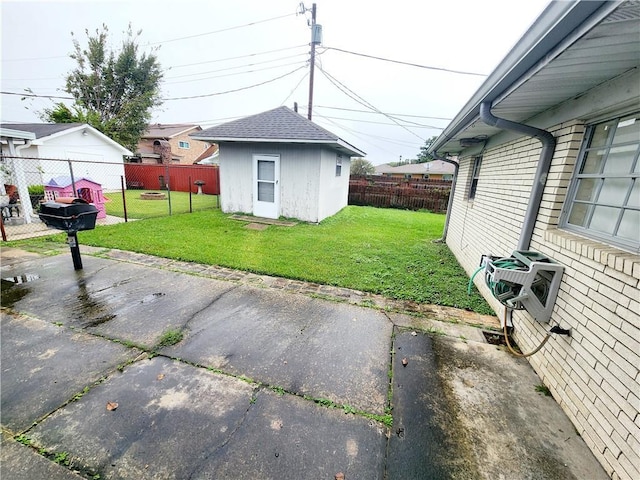 view of patio / terrace with ac unit and a storage shed