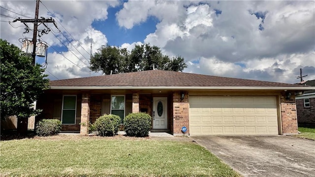 single story home with a garage and a front lawn