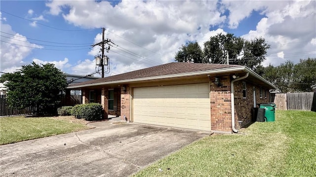 ranch-style home with a front yard and a garage