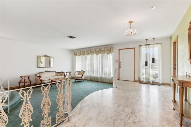 living room featuring an inviting chandelier