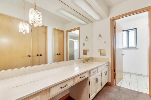 bathroom featuring tile patterned floors and vanity