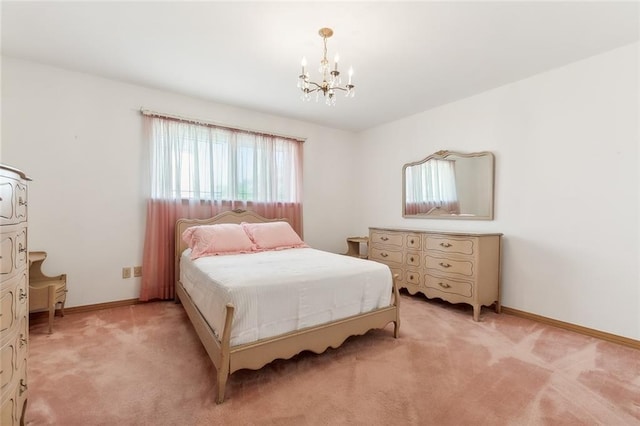 bedroom with light carpet and a notable chandelier