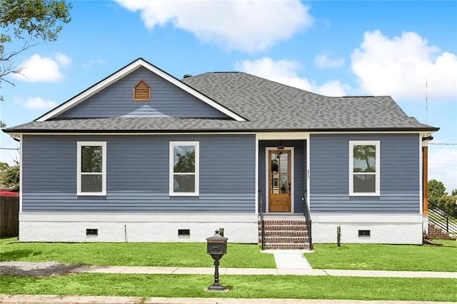 view of front of property with a front lawn