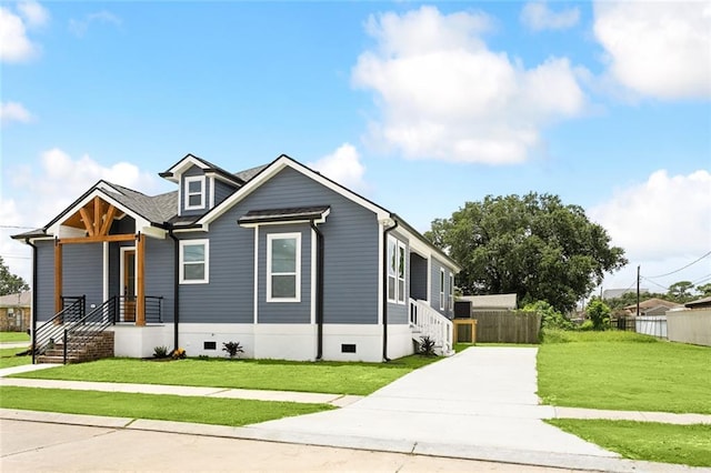 view of front of house with a front lawn