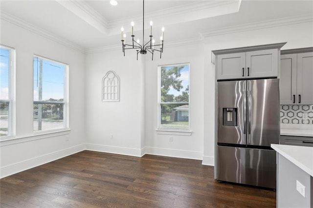 kitchen featuring stainless steel refrigerator with ice dispenser, dark wood-type flooring, and gray cabinets