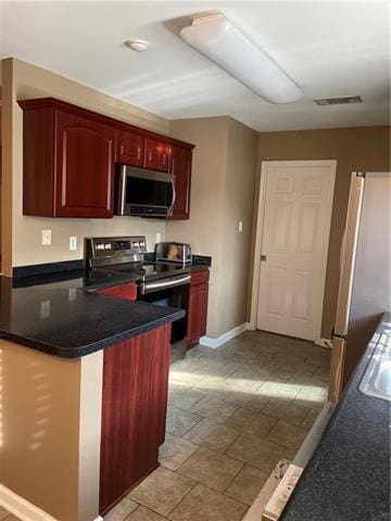 kitchen featuring stainless steel appliances and sink