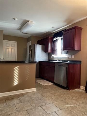 kitchen featuring stainless steel dishwasher and sink