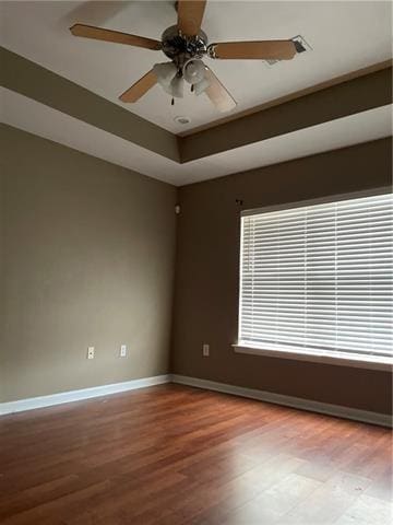 unfurnished room featuring ceiling fan and light hardwood / wood-style flooring