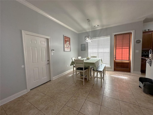 tiled dining room with crown molding