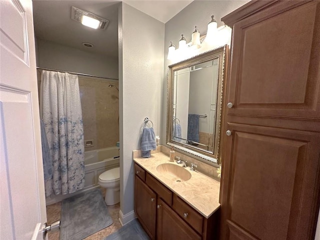 full bathroom with toilet, shower / bath combo, vanity, and tile patterned flooring