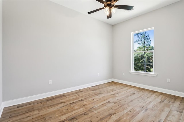 unfurnished room featuring ceiling fan and light wood-type flooring