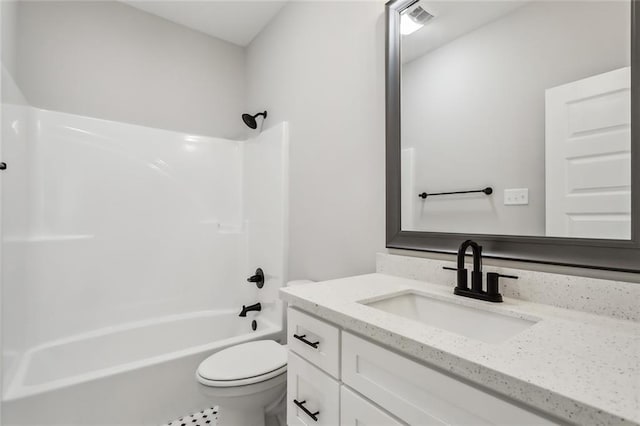 full bathroom with toilet, tub / shower combination, vanity, and tile patterned flooring