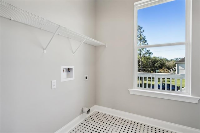 laundry area with hookup for a washing machine and hookup for an electric dryer