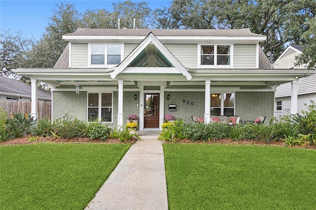 view of front of home with a front yard