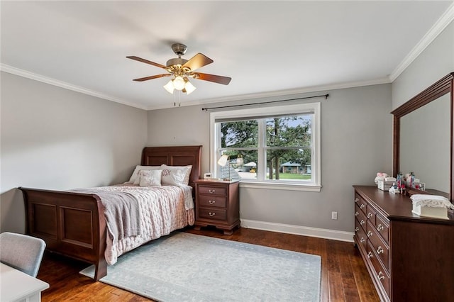 bedroom with crown molding, ceiling fan, and dark hardwood / wood-style floors