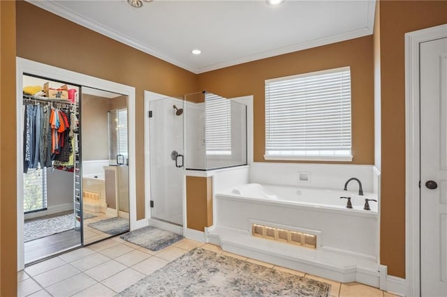 bathroom with ornamental molding, shower with separate bathtub, and tile patterned floors