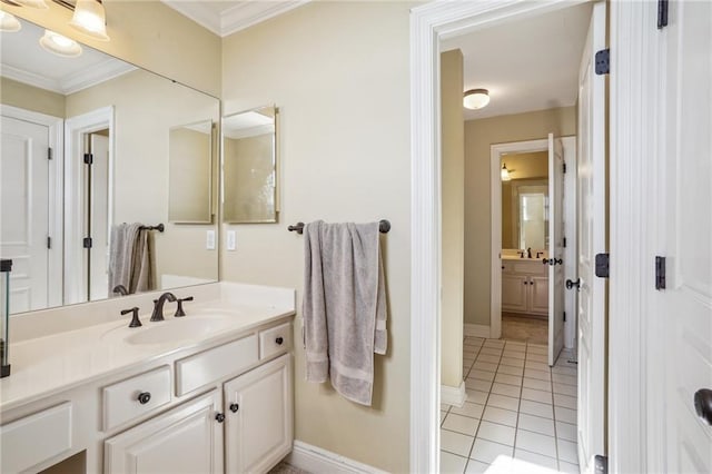 bathroom with vanity, tile patterned floors, and crown molding